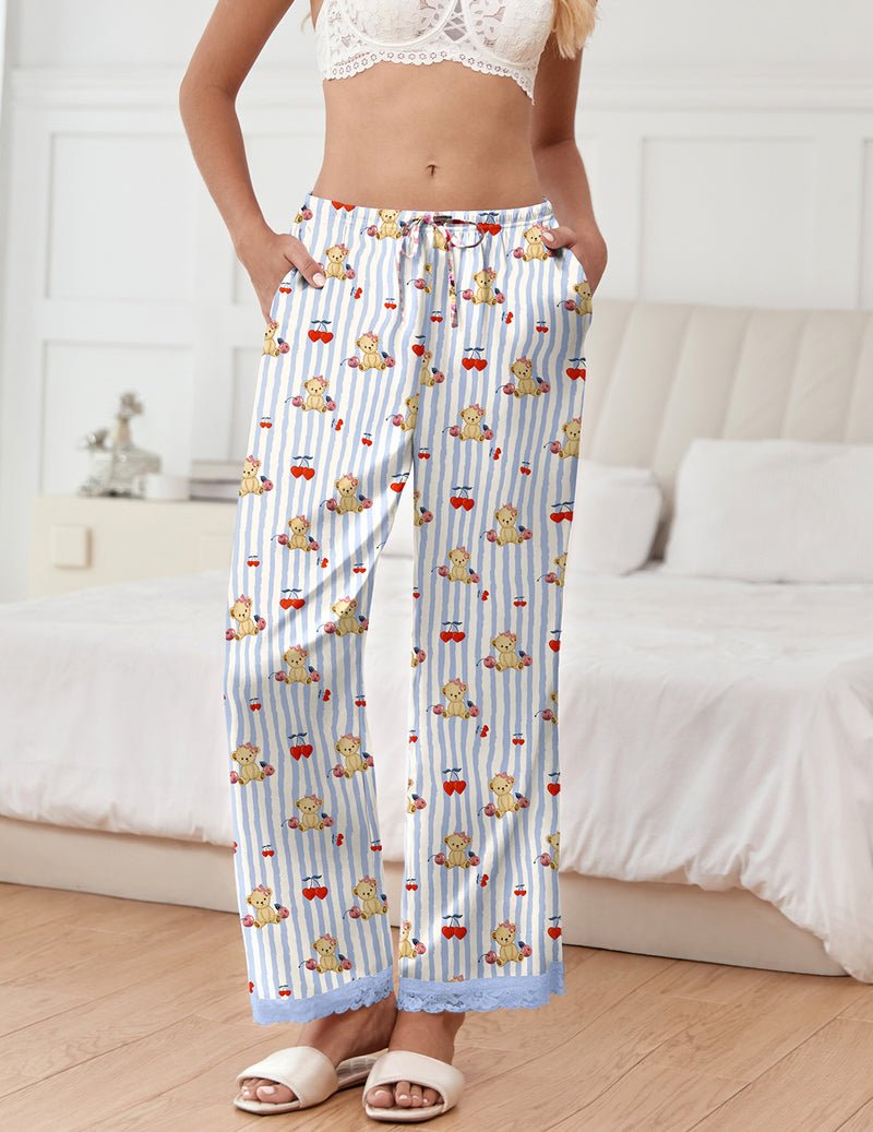 Light blue striped pajama pants with cute teddy print and bow accents, elastic waist