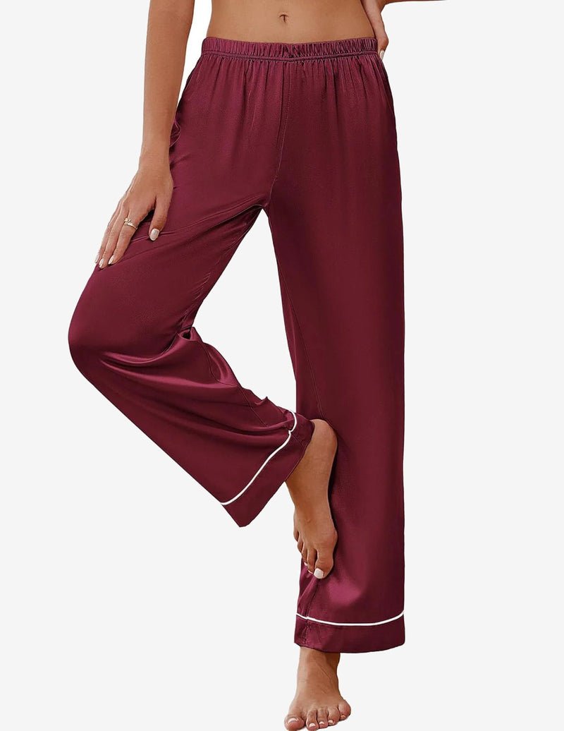 Silk satin pajama pants in burgundy with contrast piping at cuffs