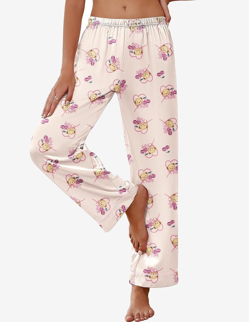 Light pink satin pajama pants with teddy print, elastic waistband