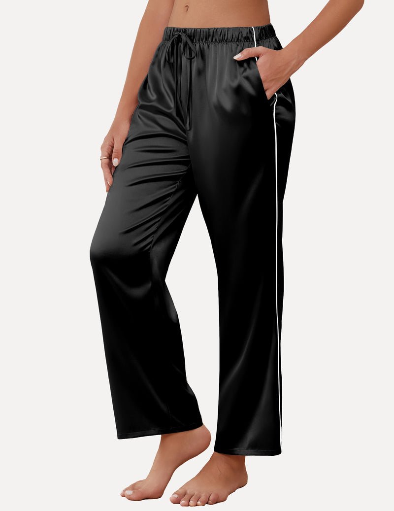Black satin lounge pants with elastic drawstring waist and wide cropped legs