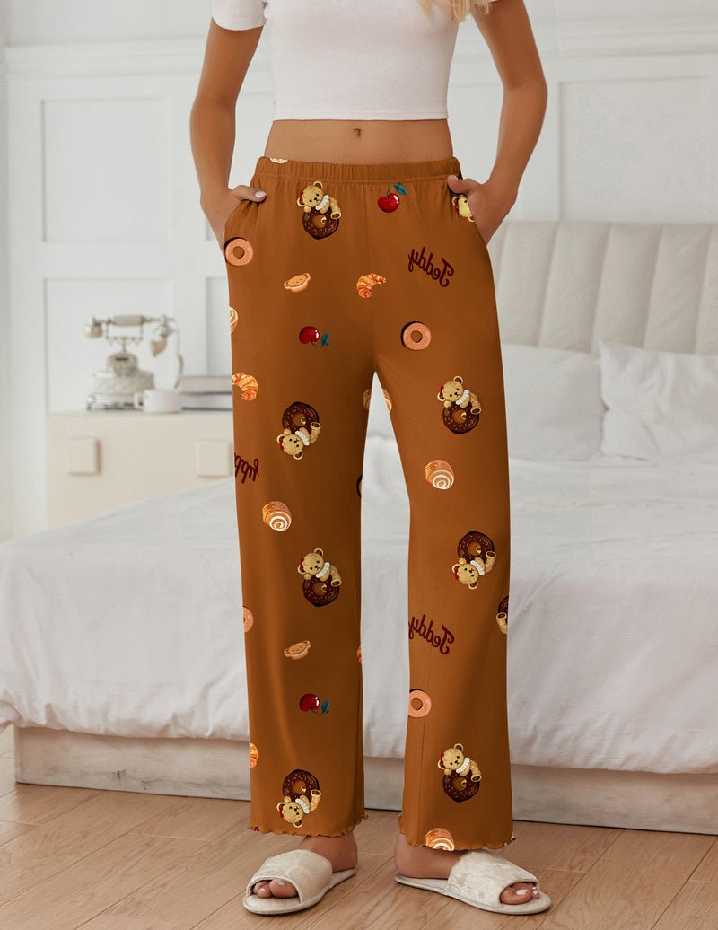 Brown teddy sleep pants with elastic waistband and colorful cartoon mix, full-length