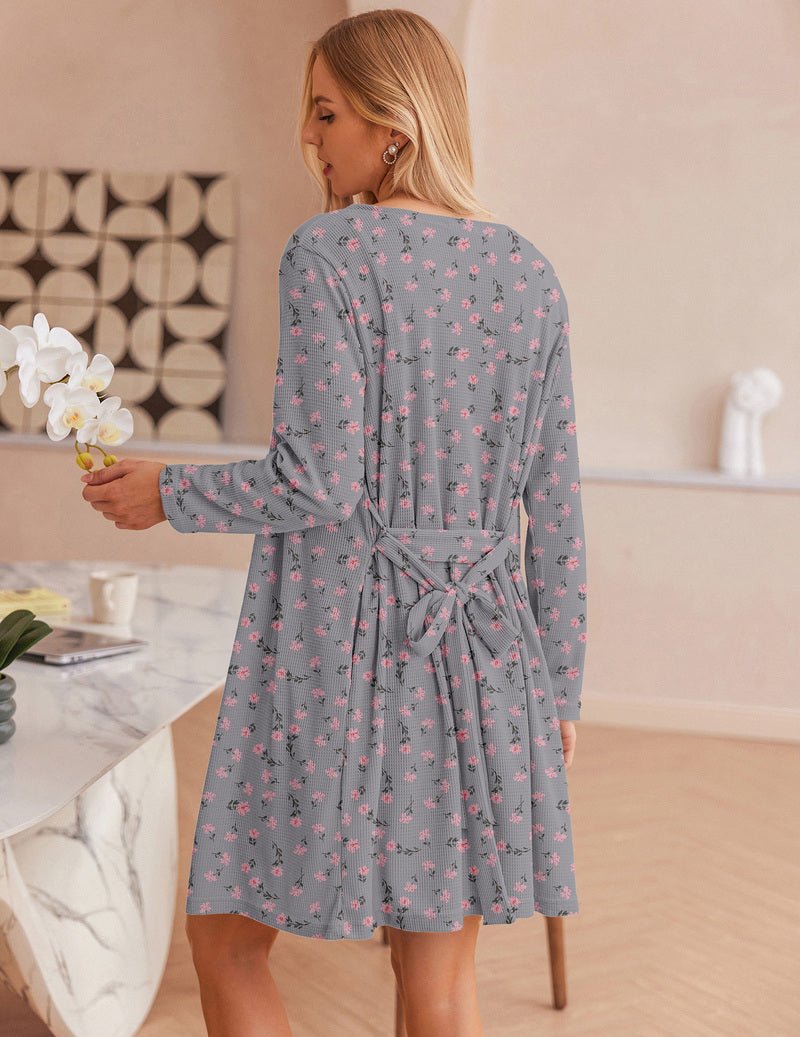 Back view of gray micro-floral waffle pajama dress with tie belt and matching shorts