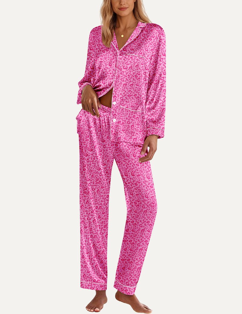 Pink leopard-print satin pajama set with button-front top and matching long trousers