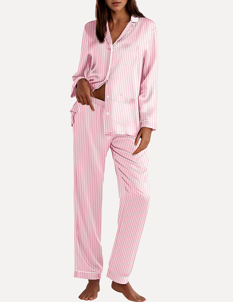 Two-piece satin pajama set in pink-and-white vertical stripes; button-down top and pants