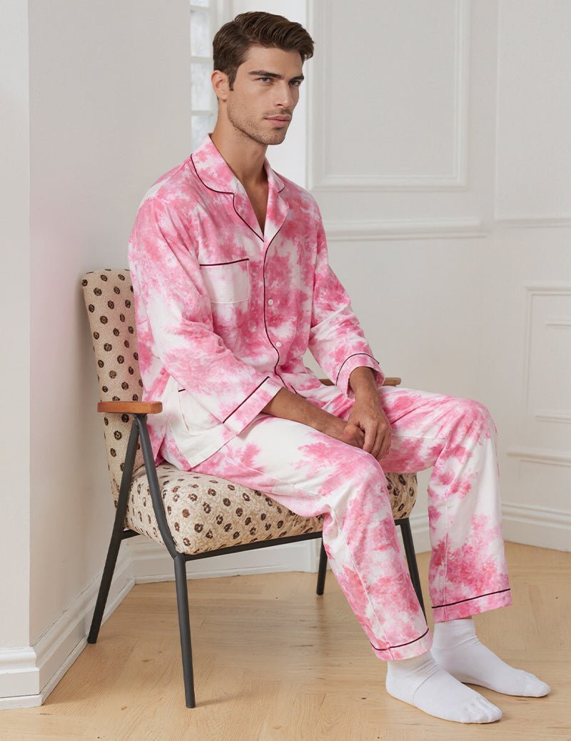 Men's pink tie-dye pajama set, long-sleeve button shirt and long pants, seated