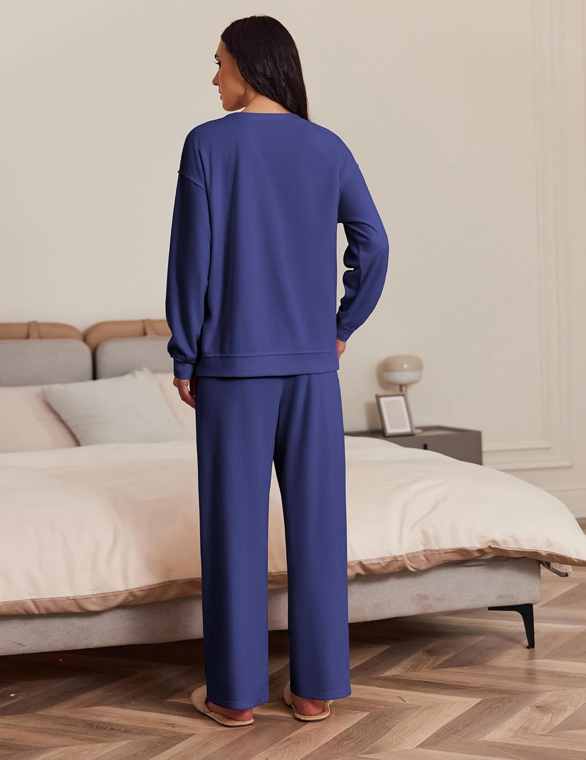 Navy blue tracksuit set, long-sleeve sweatshirt and straight/wide-leg pants (back view)