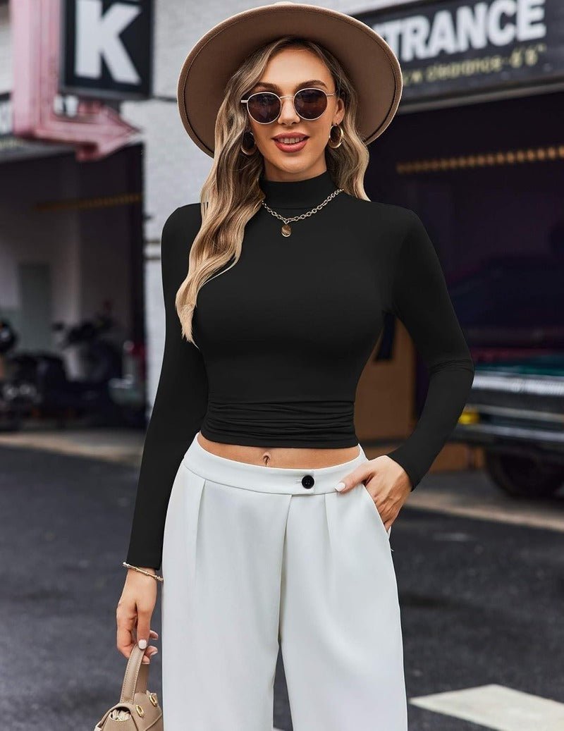 Black long-sleeve turtleneck thermal top with high collar and ruched hem