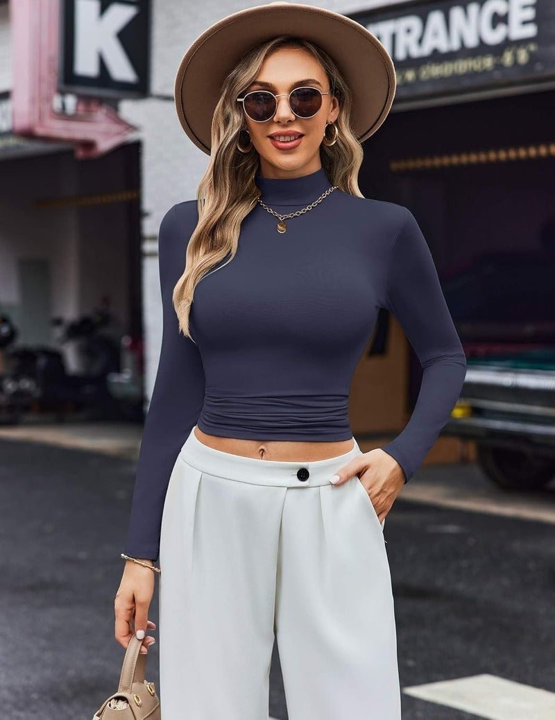 Navy long-sleeve turtleneck thermal top, fitted with high neck