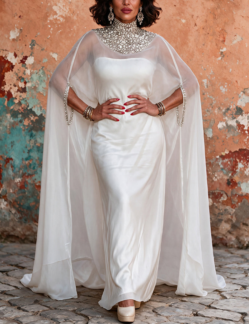 White high-neck beaded satin evening gown with draped cape sleeves