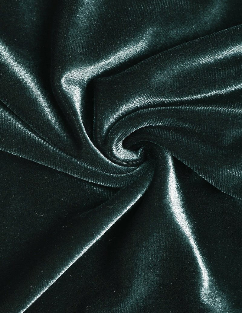 Dark green velvet fabric with soft sheen texture, close-up