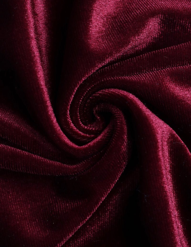 Wine red velvet fabric close-up with swirled texture