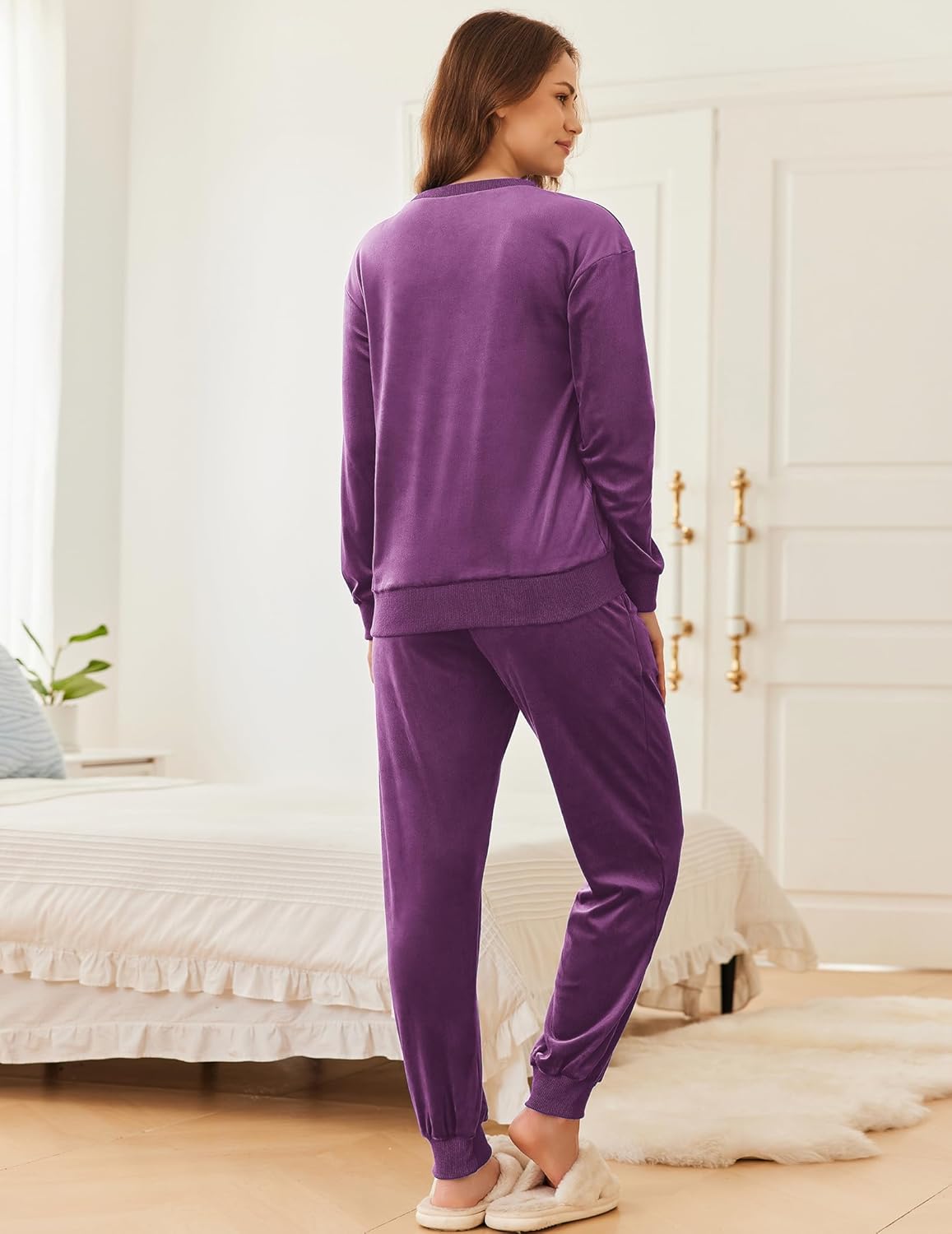 Back view of purple velvet long sleeve jogger pajama set, matching cuffed pants