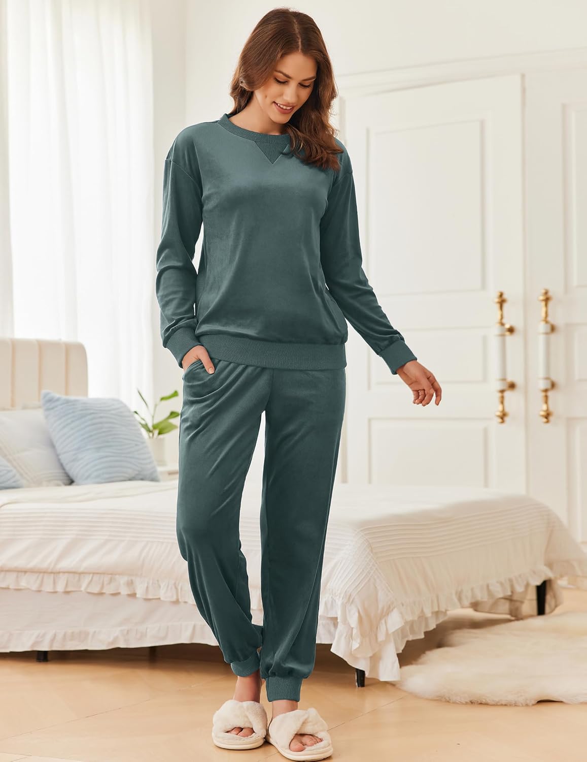 Dark green velvet long-sleeve pajama set with crew neck top and matching joggers