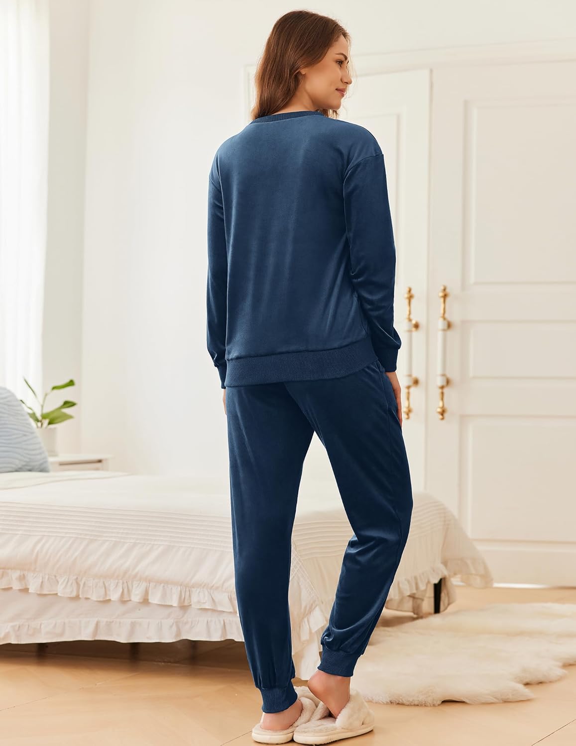 Velvet long sleeve jogger pajama set in navy blue, back view