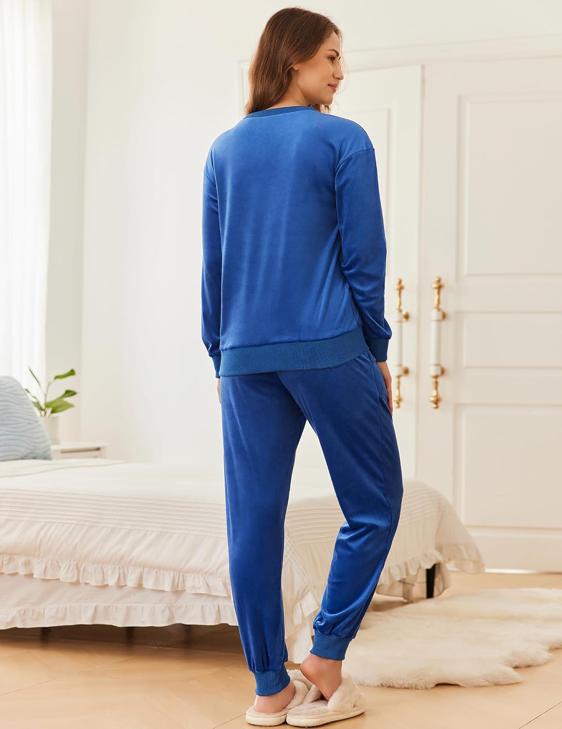 Royal blue velvet long-sleeve pajama top and jogger pants, back view