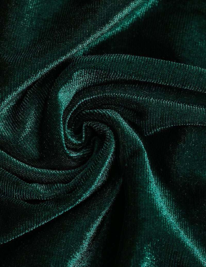 Dark green velvet fabric closeup with swirl texture