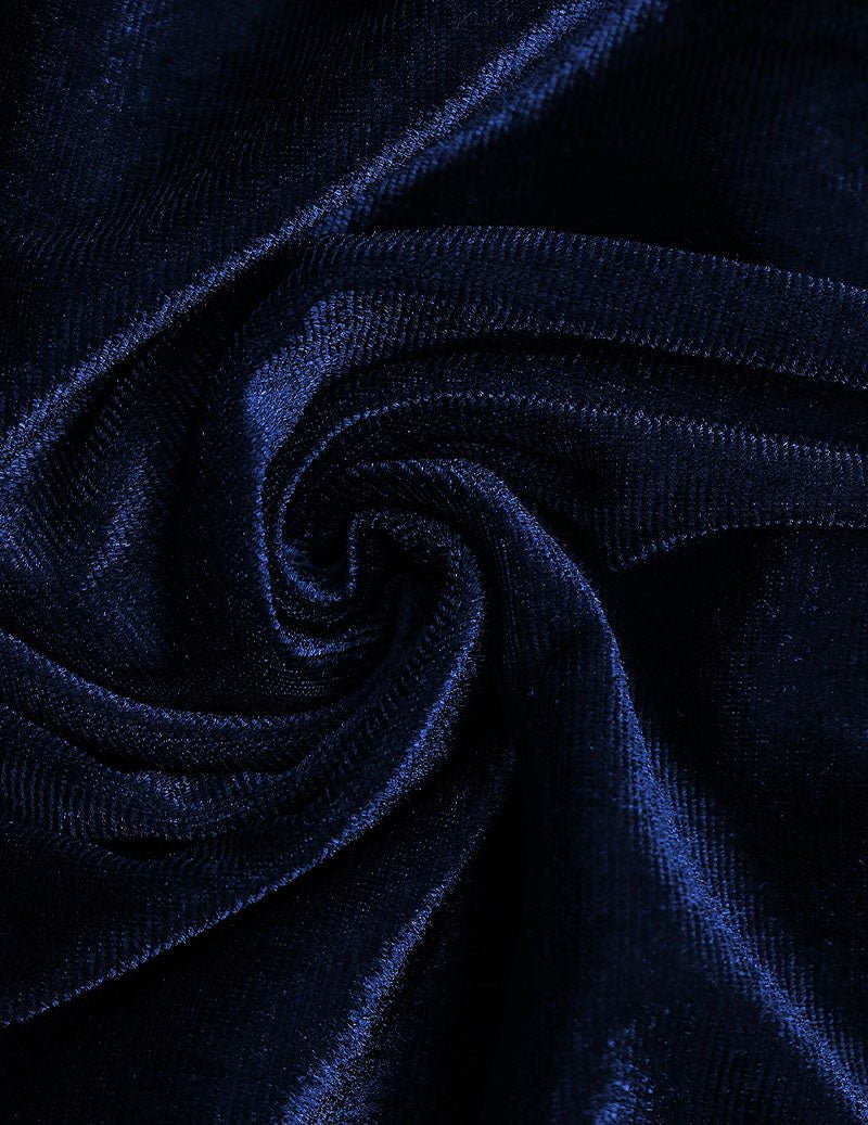 Navy blue velvet fabric closeup with swirl texture