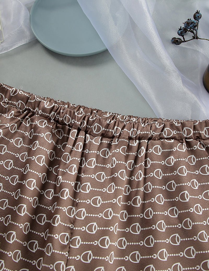 Brown robe pants with elastic waistband, allover chain-heart pattern