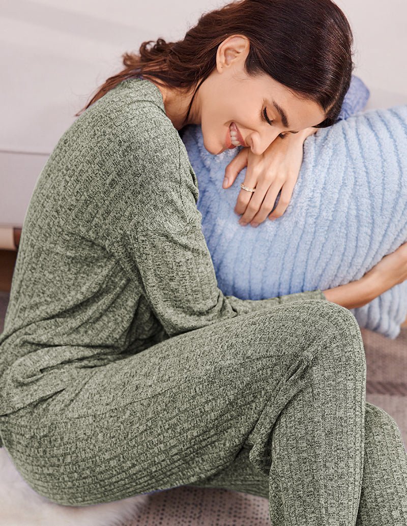 Ribbed knit lounge set close-up: long-sleeve top and wide-leg pants in grey green