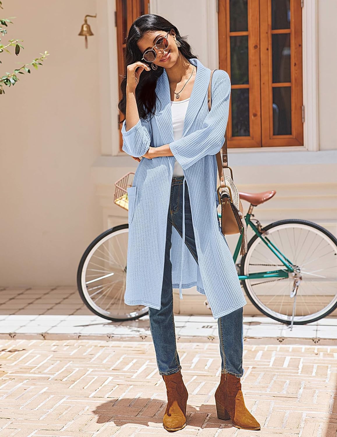 Light blue waffle knit kimono robe with tie waist, V-neck, side pockets, 3/4 sleeves.