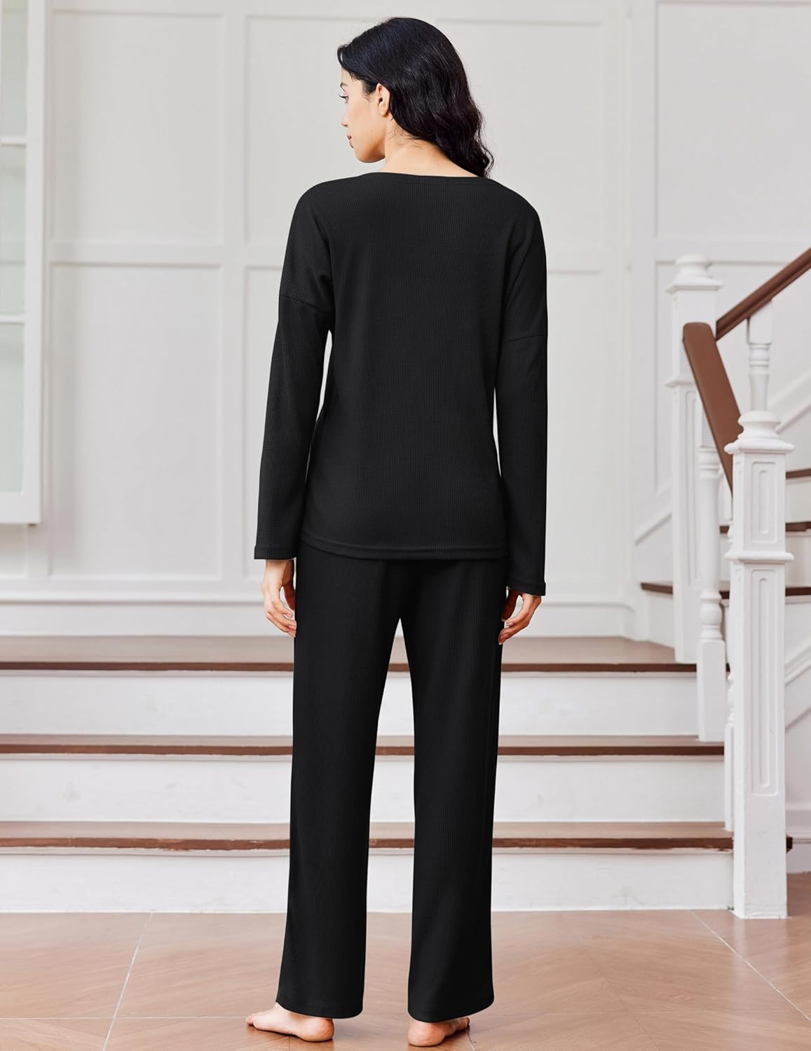 Black waffle-knit pajama set, long-sleeve top and wide-leg pants (back view)