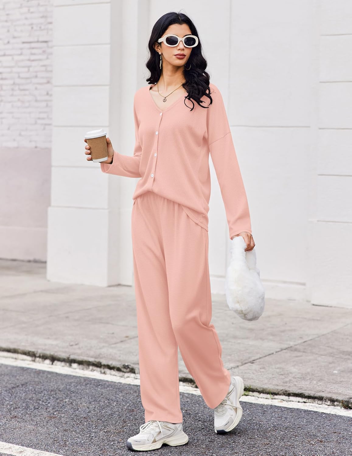 Pink waffle-knit lounge set with henley button top and relaxed wide-leg pants