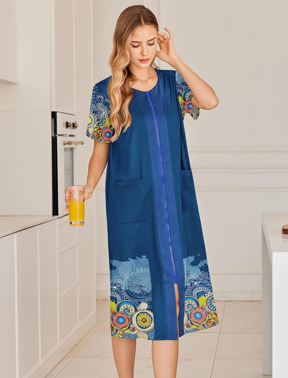 Blue zip-front house robe with short sleeves, side pockets, ornate print hem