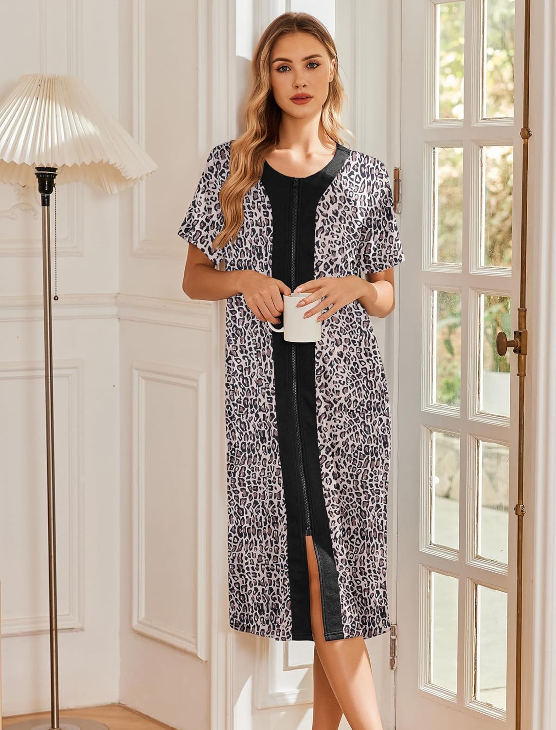 White leopard-print robe with black zipper, short sleeves, long open front