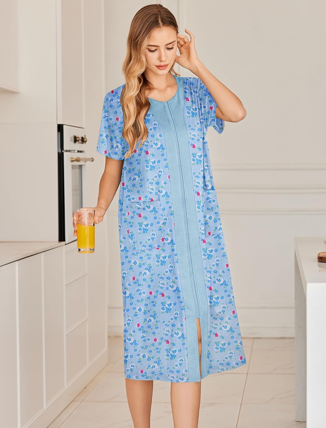 Light blue zip-front bathrobe with short sleeves, pink floral all over