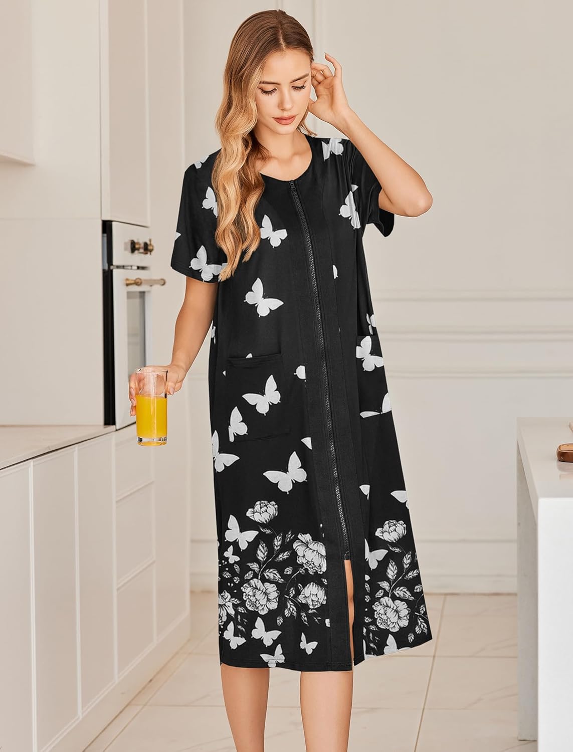 Black zip-front short-sleeve robe with large butterfly and flower print, front slit