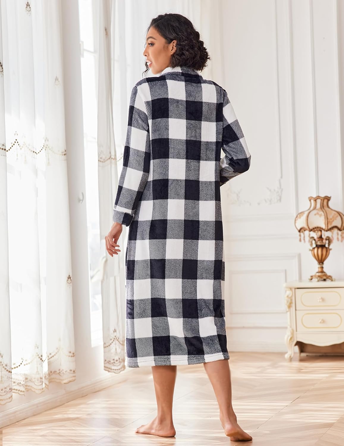 Side/back look: black-and-white plaid fleece zip bathrobe with long sleeves and straight hem