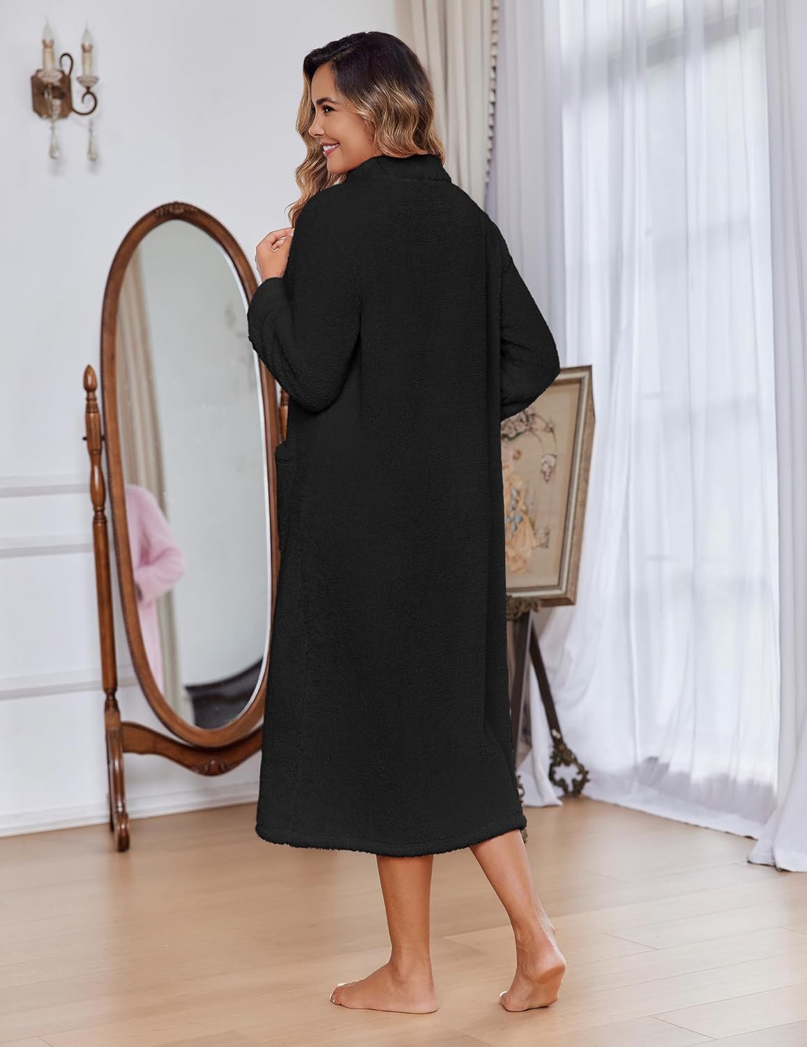 Black fleece zip robe from the back view, long sleeves, mid-calf length