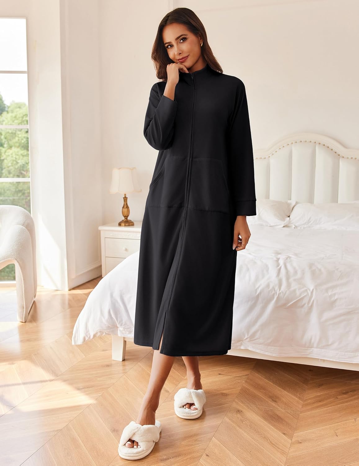 Black long sleeve zip robe house coat with stand collar and side pockets.