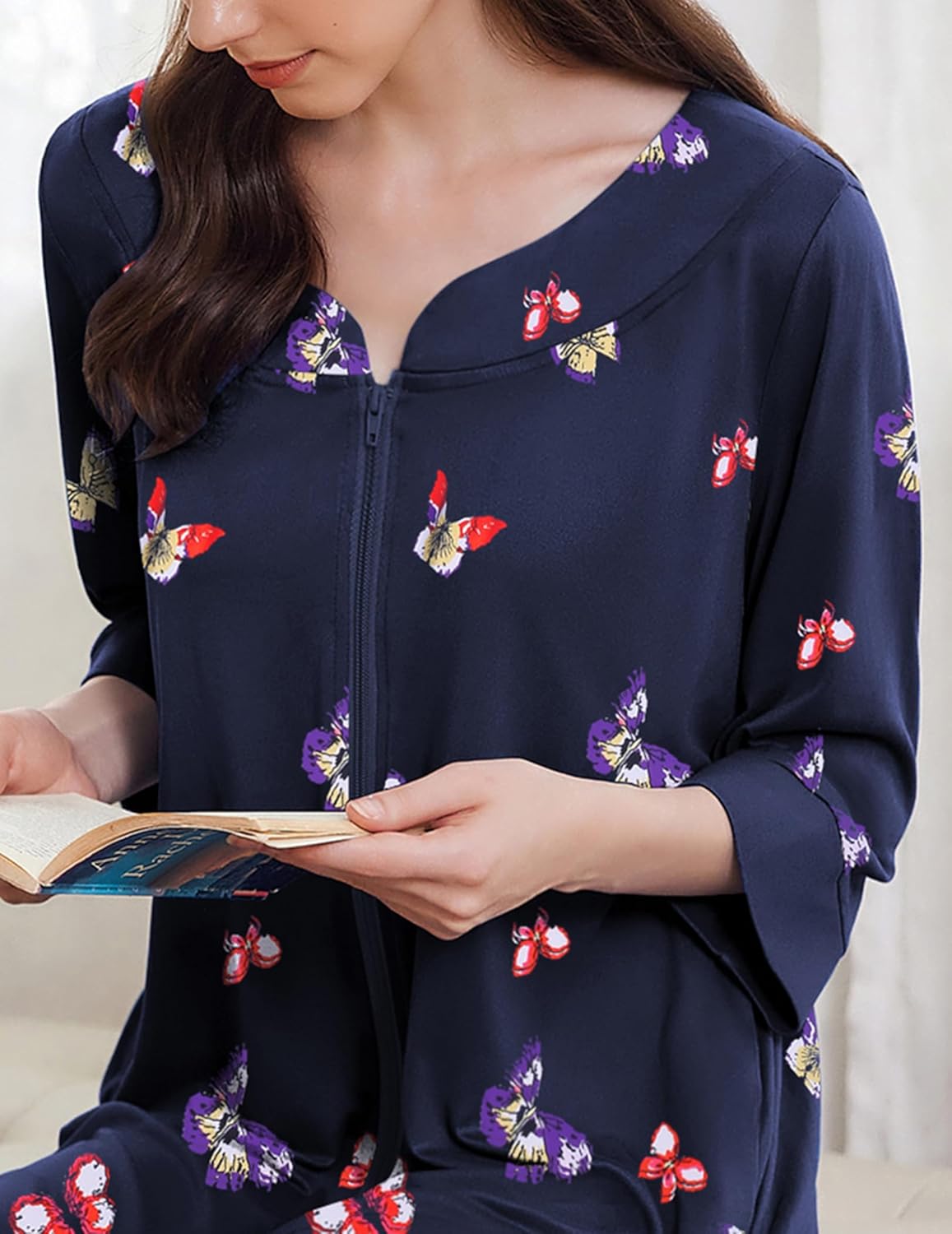 Navy zipper nightgown close-up: neckline detail and butterfly print, front zip