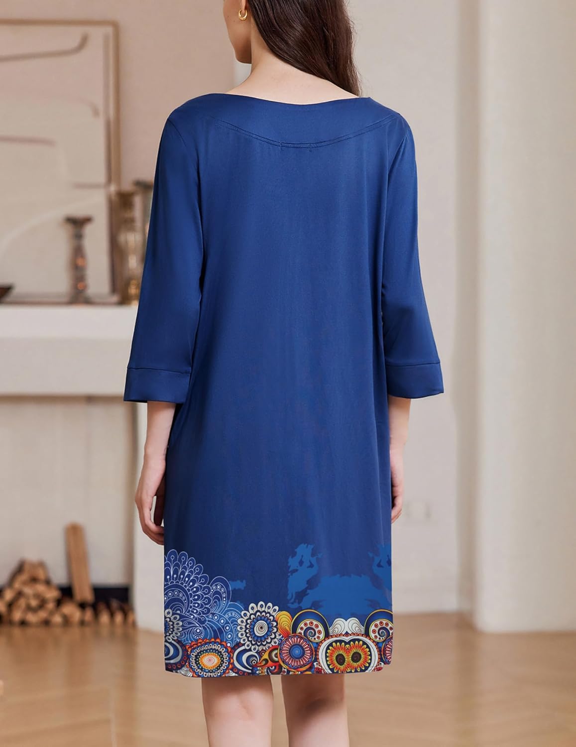 Blue zip-front nightgown, 3/4 sleeves, rounded collar, colorful hem print