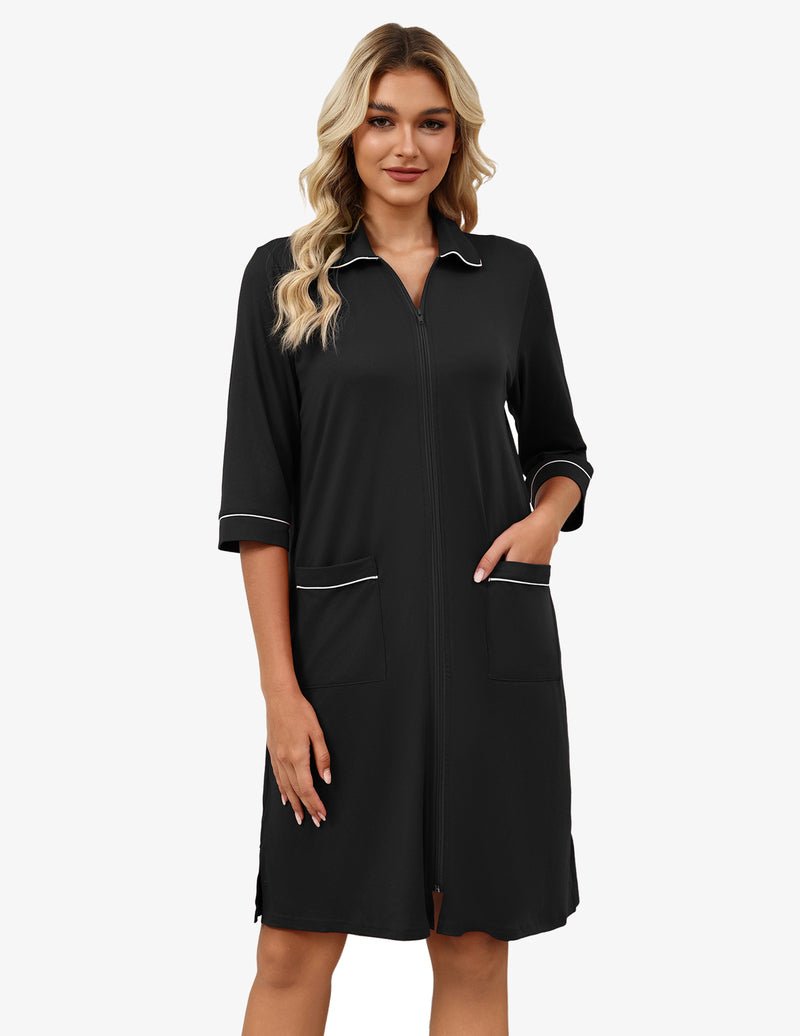 Women’s 3/4 sleeve zip robe in black, collared neckline with side patch pockets.