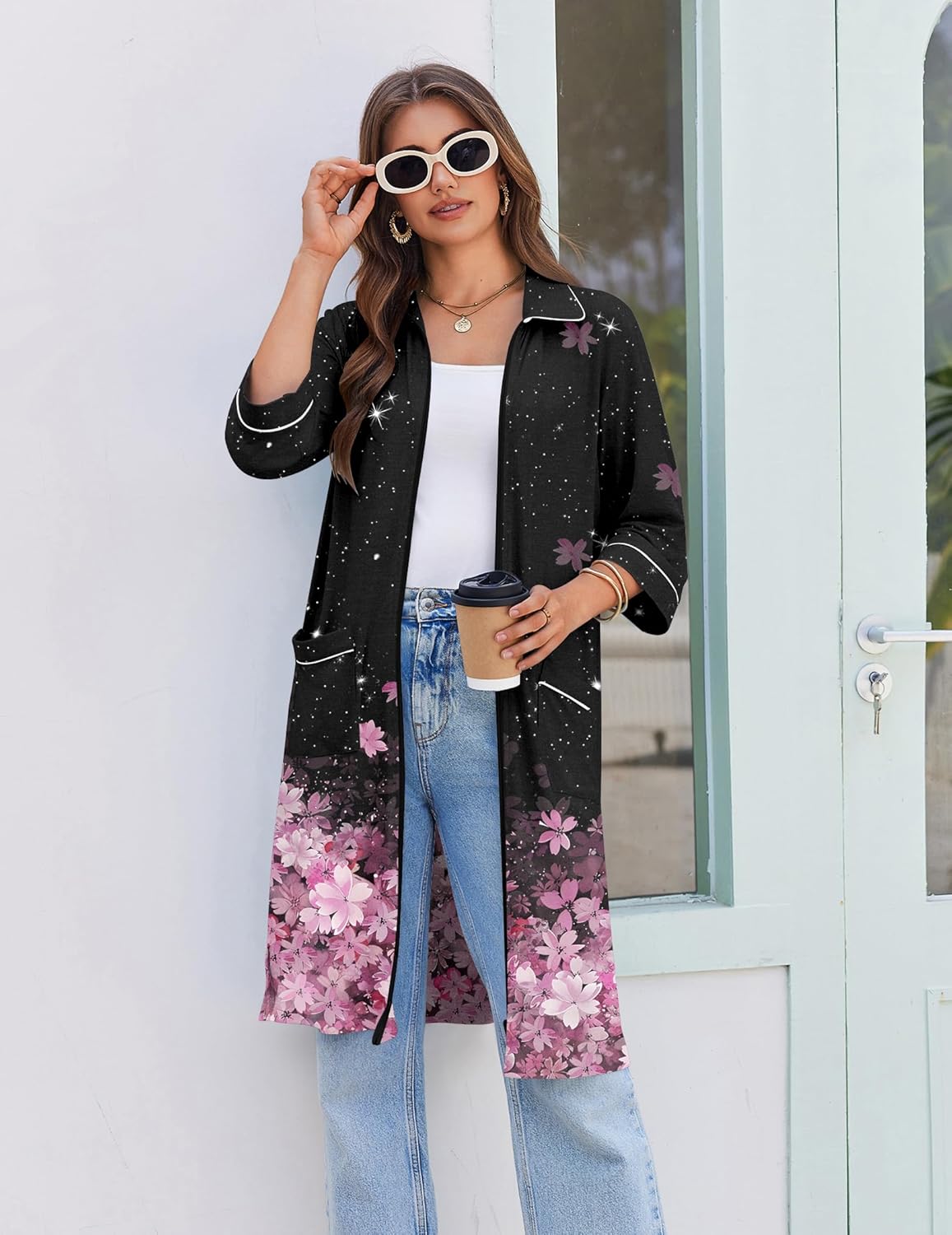 Black 3/4 sleeve zip robe with pink floral and star print, contrast piping pockets.