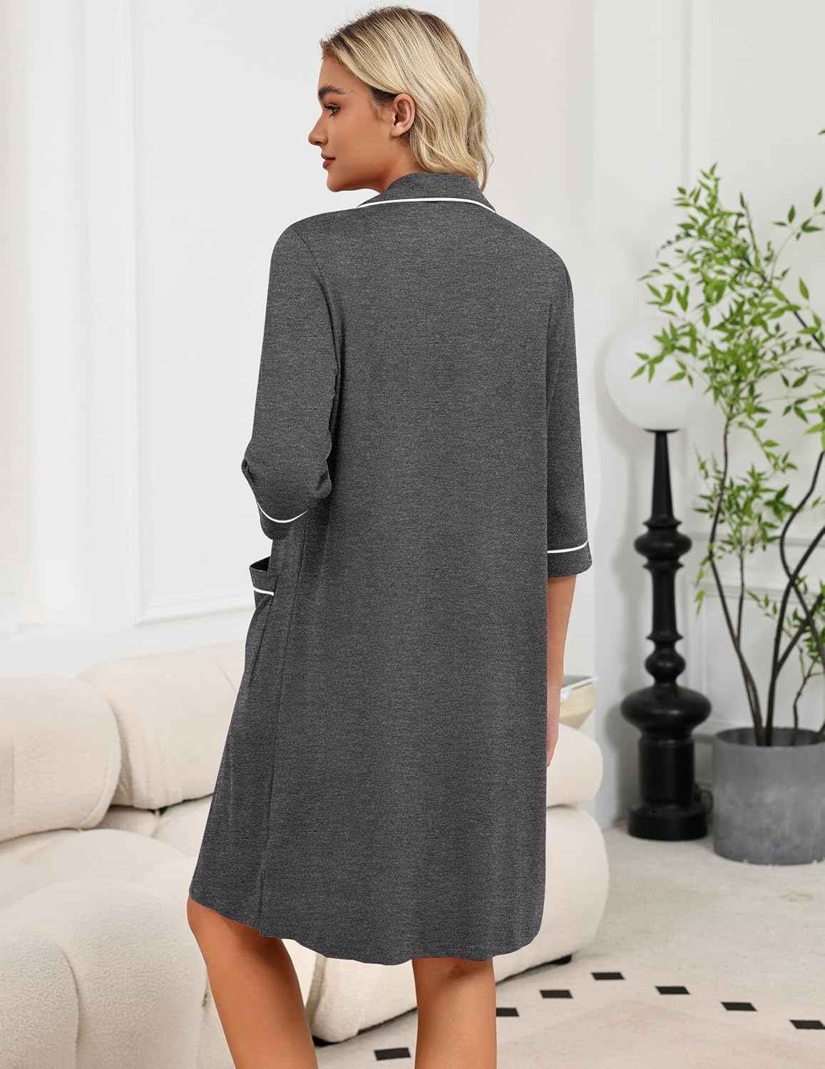 Light grey zip robe back view with 3/4 sleeves and side seam details.