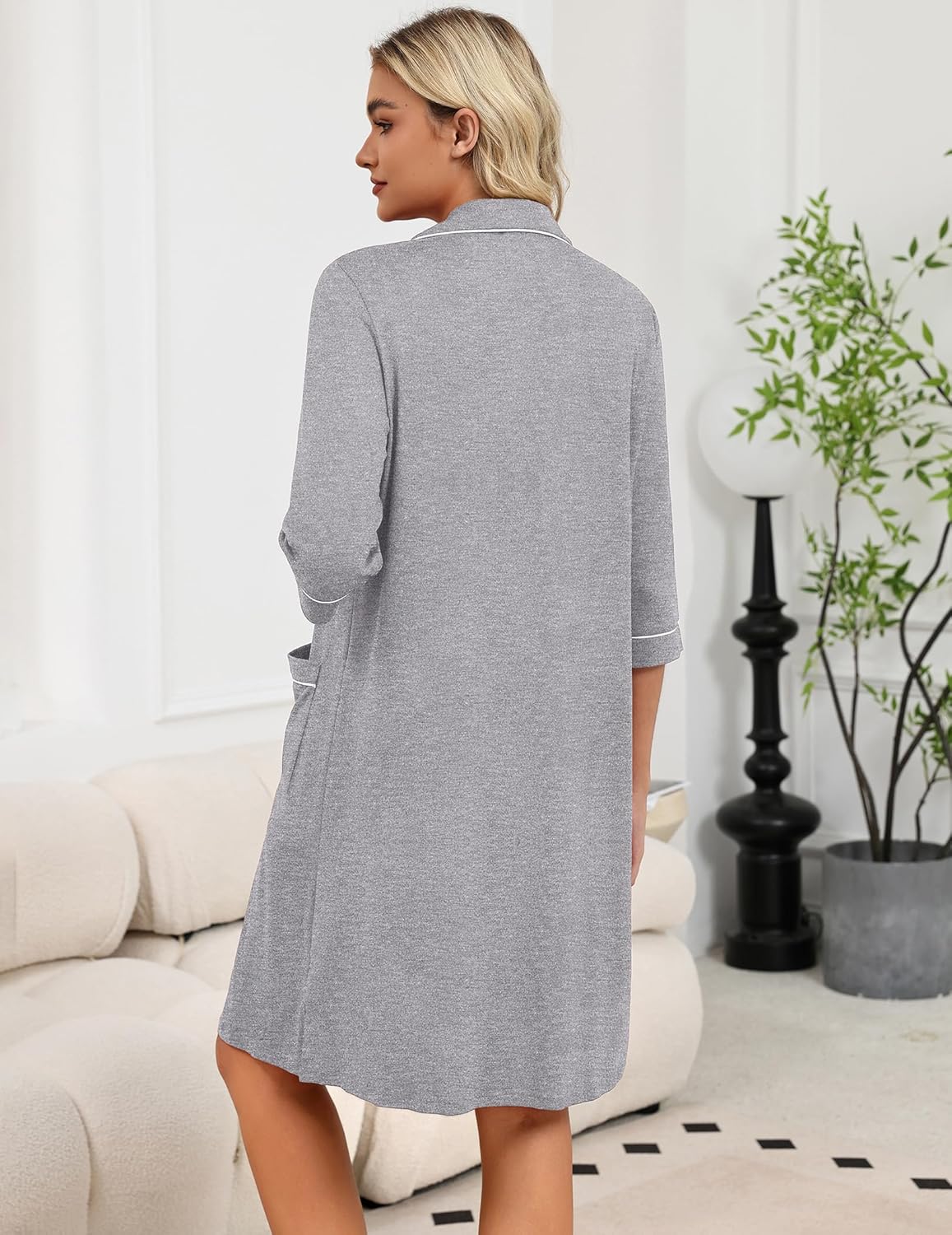 Back view of grey zip robe, 3/4 sleeves, stand collar