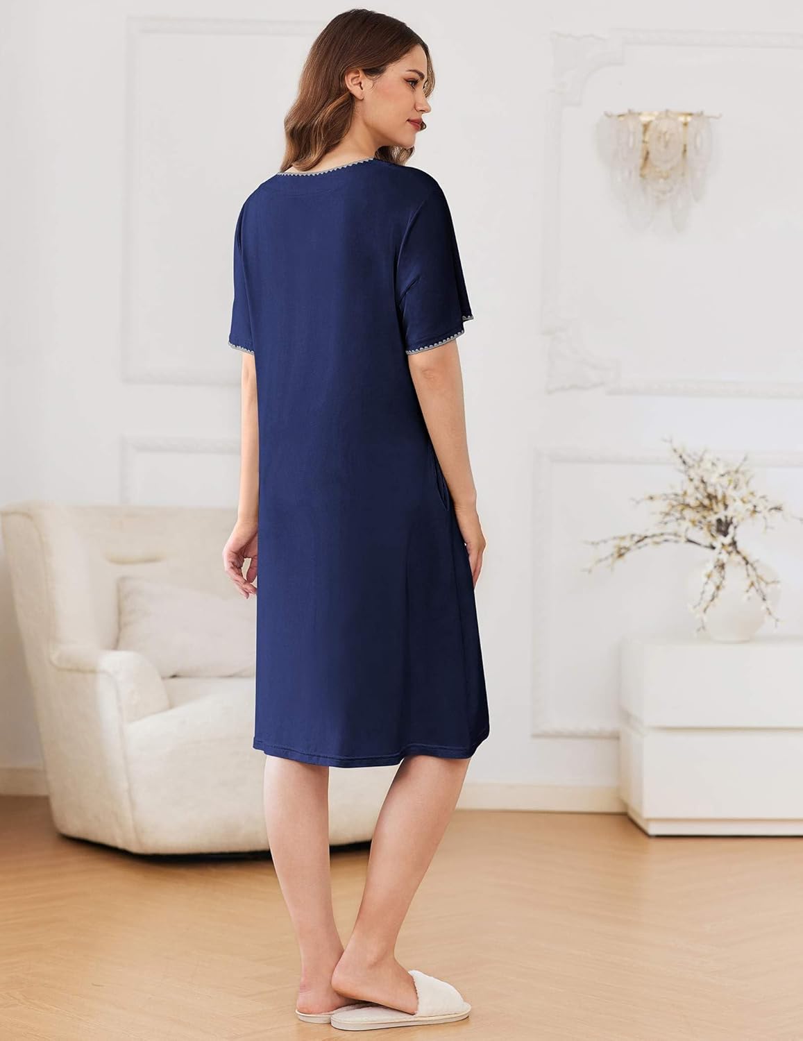 Navy blue zip-front knee-length bathrobe, short sleeves, back view