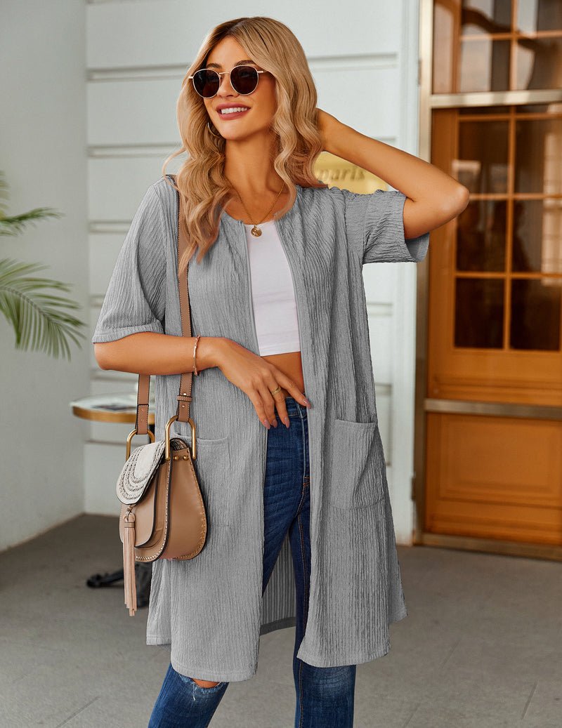 Grey knit short bathrobe with front placket and patch pockets