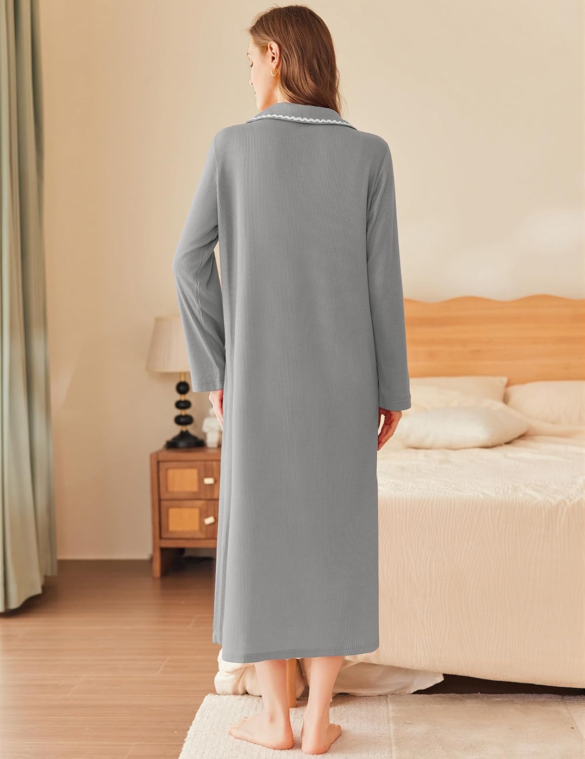Light gray long waffle-knit bathrobe with zip front and contrast trim, back view