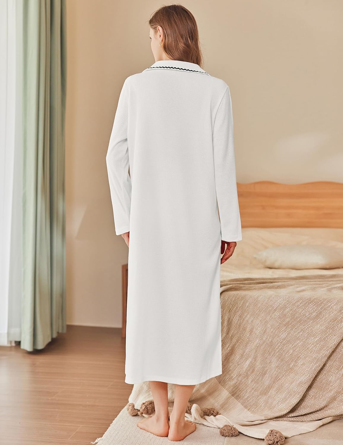 White long waffle-knit bathrobe with zip front and hood, back view