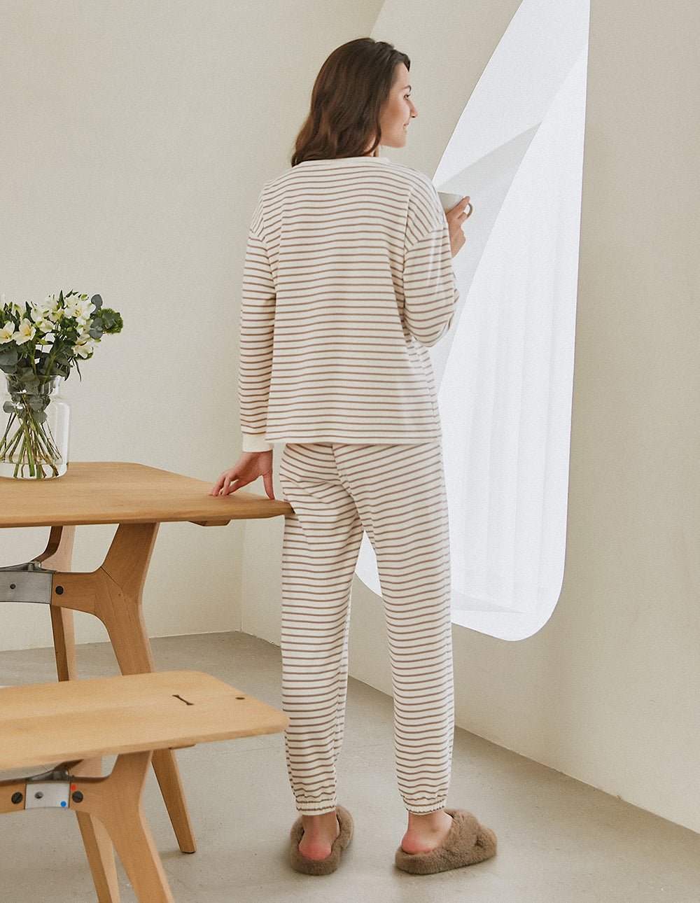 Striped cotton pajama set, long-sleeve top and pants, cream with dark stripes, back view