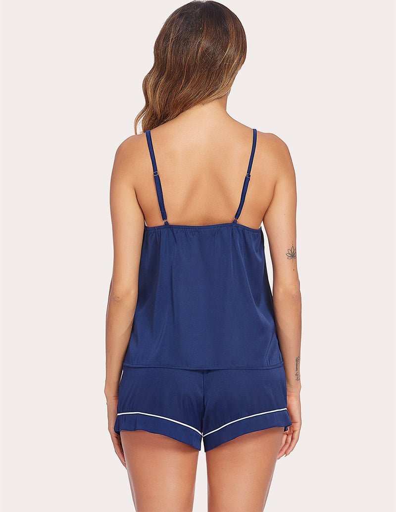 Back view: satin cami pajama set in navy blue with thin straps and matching shorts