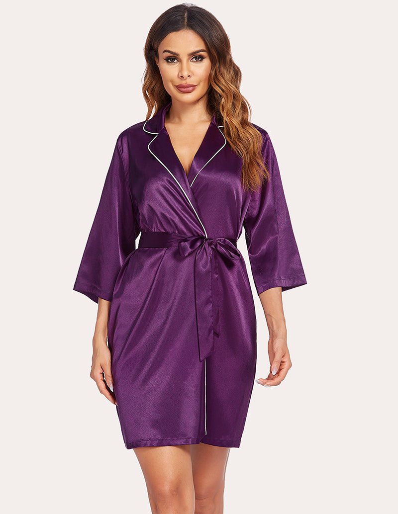 Satin robe, 3/4 sleeves, V-neck with white trim, tie waist, dark purple, front view