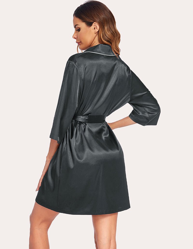 Dark satin robe, back view, with tie waist and 3/4-length sleeves.