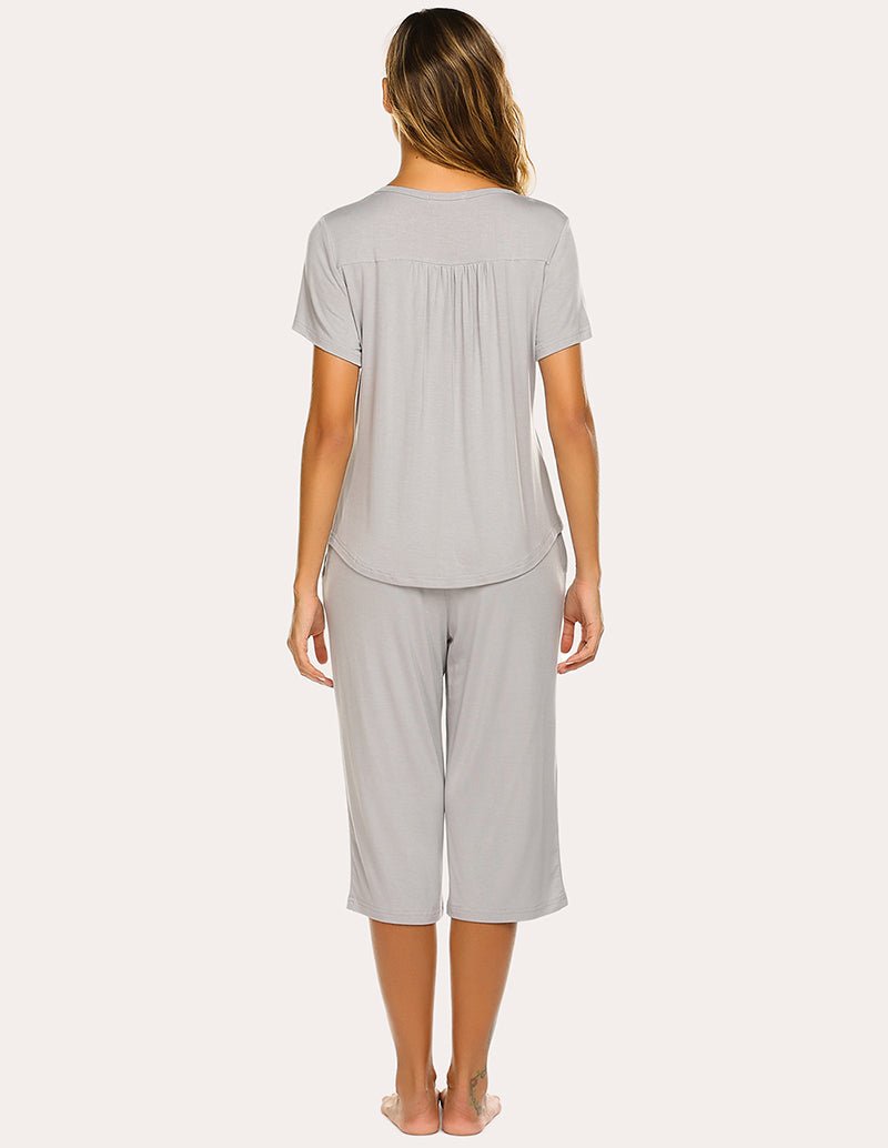 Light grey button-up pajama top and capri pants set, rear view