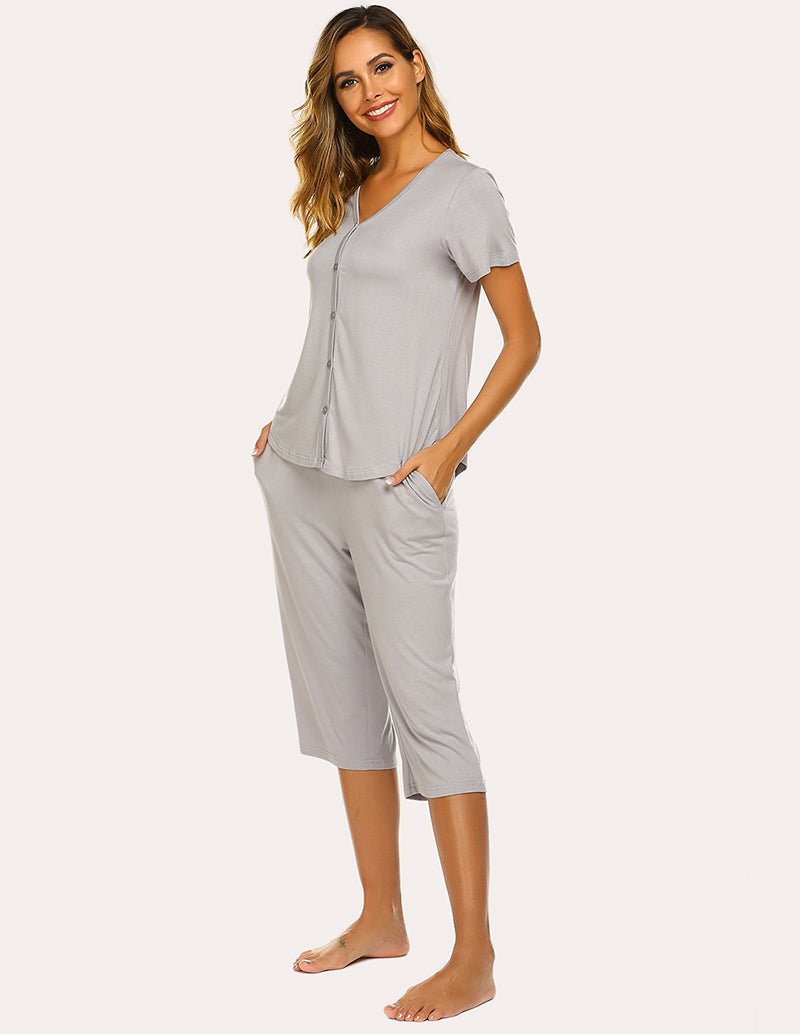 Light grey button-up pajama top and capri pants set, side view