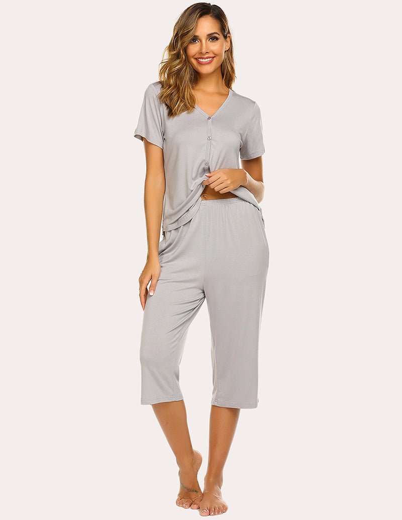 Light grey V-neck button-up pajama top with capri pants set, front view